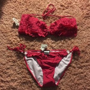 Ruffled pink bikini top and bottoms. NWT